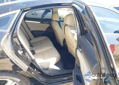 2016 Honda Civic Touring z USA, uszkodzony, nr VIN 2HGFC1F96GH108031